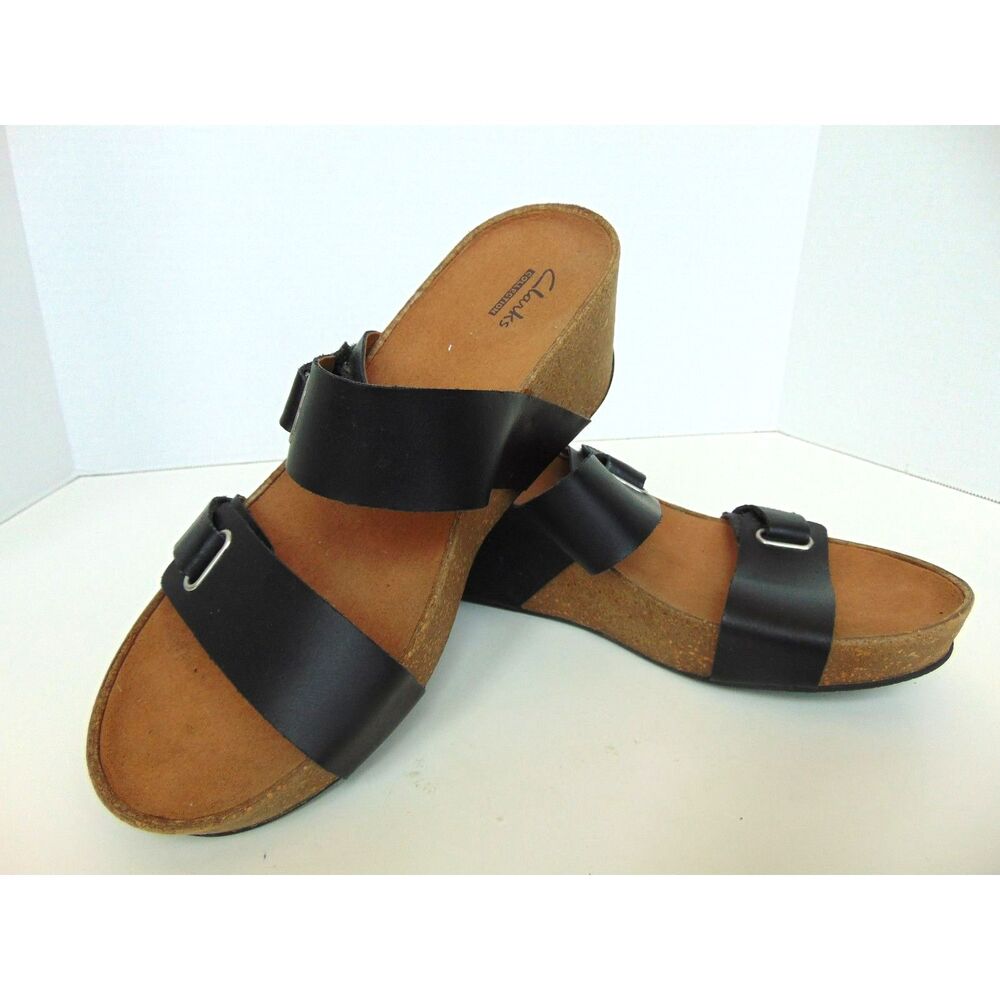 Clark Black Leather Slides Size 9M. Have been repaired. Great comfort shoe.